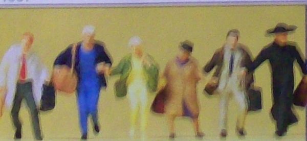 H0 Figur Reisende in großer Eile